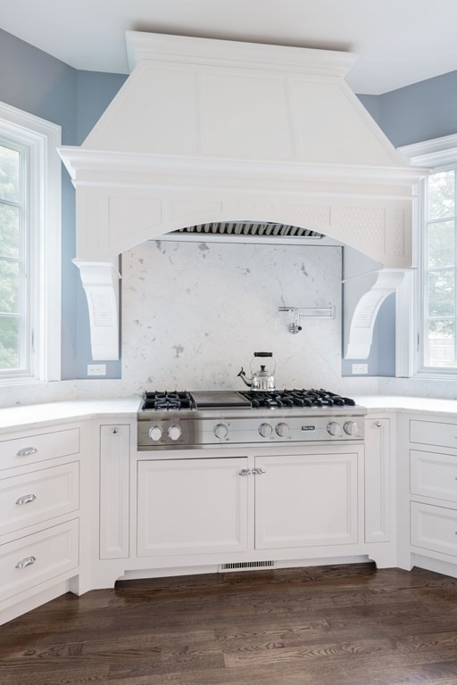 3 Brewer Way Hingham, MA 02043 - Photo 2 of 36 a white kitchen with granite countertop a stove and a sink