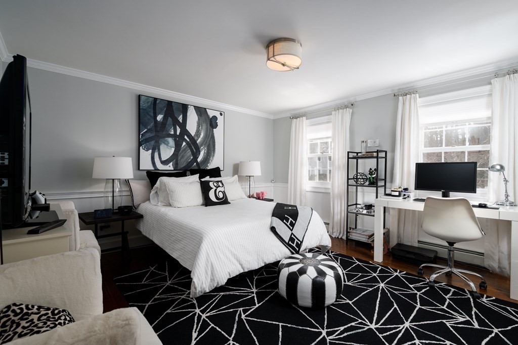 3 Brewer Way Hingham, MA 02043 - Photo 21 of 36 a view of a livingroom with furniture and a flat screen tv