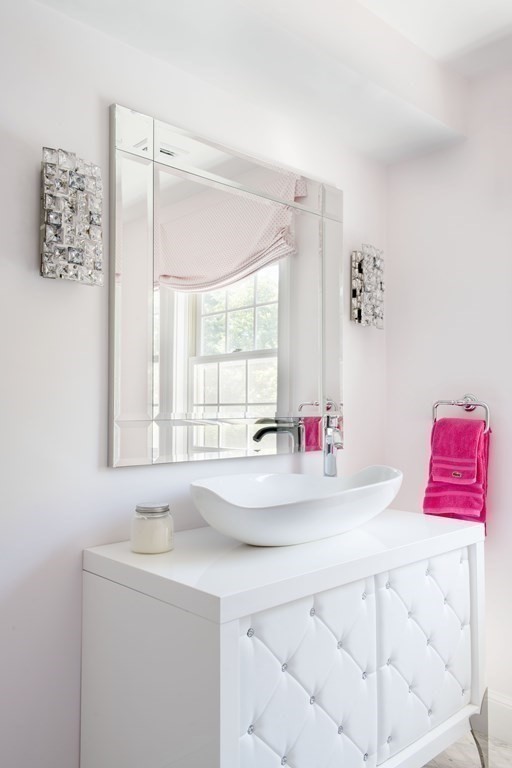 3 Brewer Way Hingham, MA 02043 - Photo 23 of 36 a bathroom with a sink a vanity and a shower