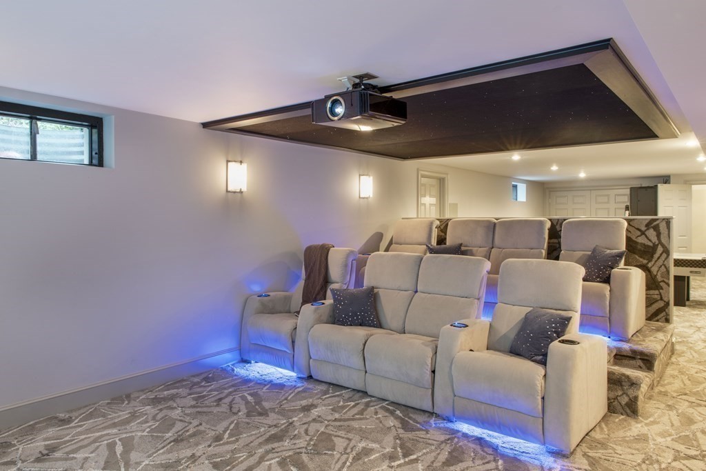 3 Brewer Way Hingham, MA 02043 - Photo 25 of 36 a living room with furniture and a ceiling fan