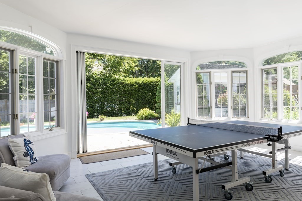 3 Brewer Way Hingham, MA 02043 - Photo 26 of 36 a view of a dining room with furniture large windows and wooden floor