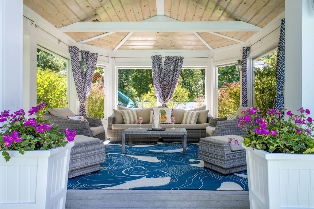 3 Brewer Way Hingham, MA 02043 - Photo 27 of 36 a living room with furniture and flowers