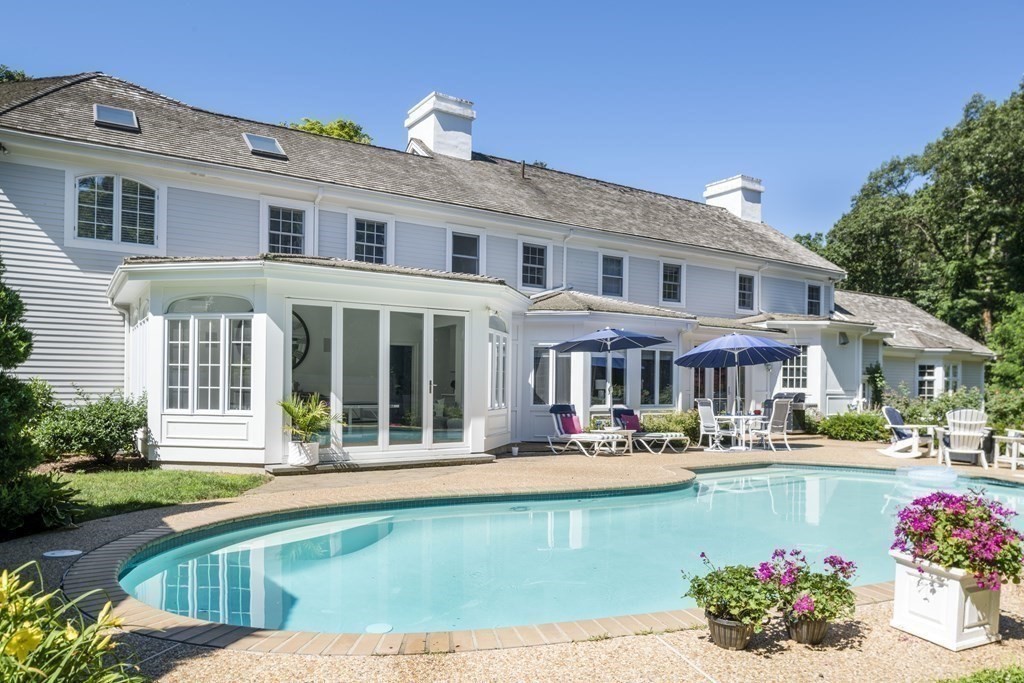 3 Brewer Way Hingham, MA 02043 - Photo 28 of 36 a front view of a house with swimming pool and porch