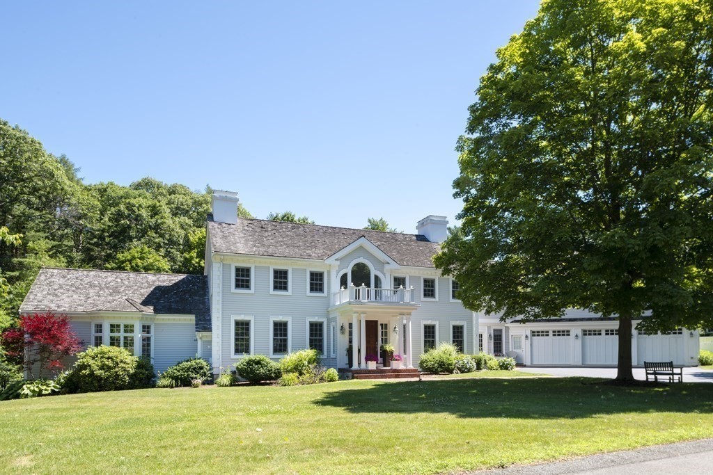 3 Brewer Way Hingham, MA 02043 - Photo 30 of 36 a front view of a building with a big yard and large trees