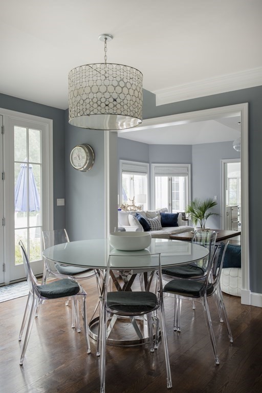 3 Brewer Way Hingham, MA 02043 - Photo 4 of 36 a view of a dining room with furniture and wooden floor