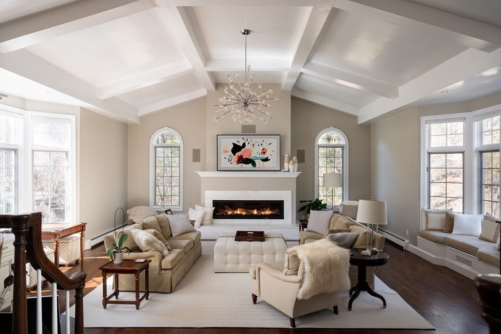 3 Brewer Way Hingham, MA 02043 - Photo 8 of 36 a living room with furniture and a fireplace