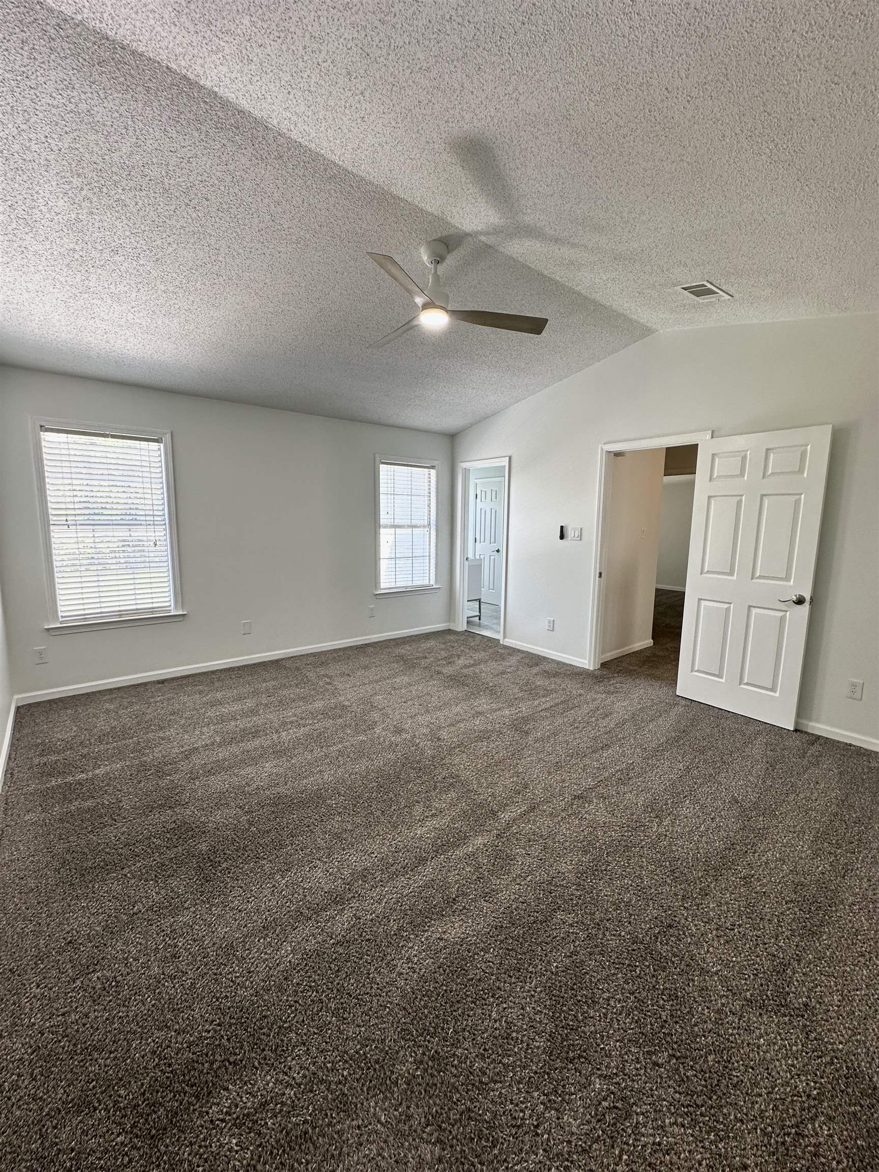 10006 Cameron Ridge Trail Memphis, TN 38016 - Photo 11 of 29 a view of an empty room with a window