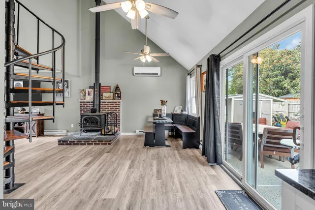 a view of a living room and hardwood floor