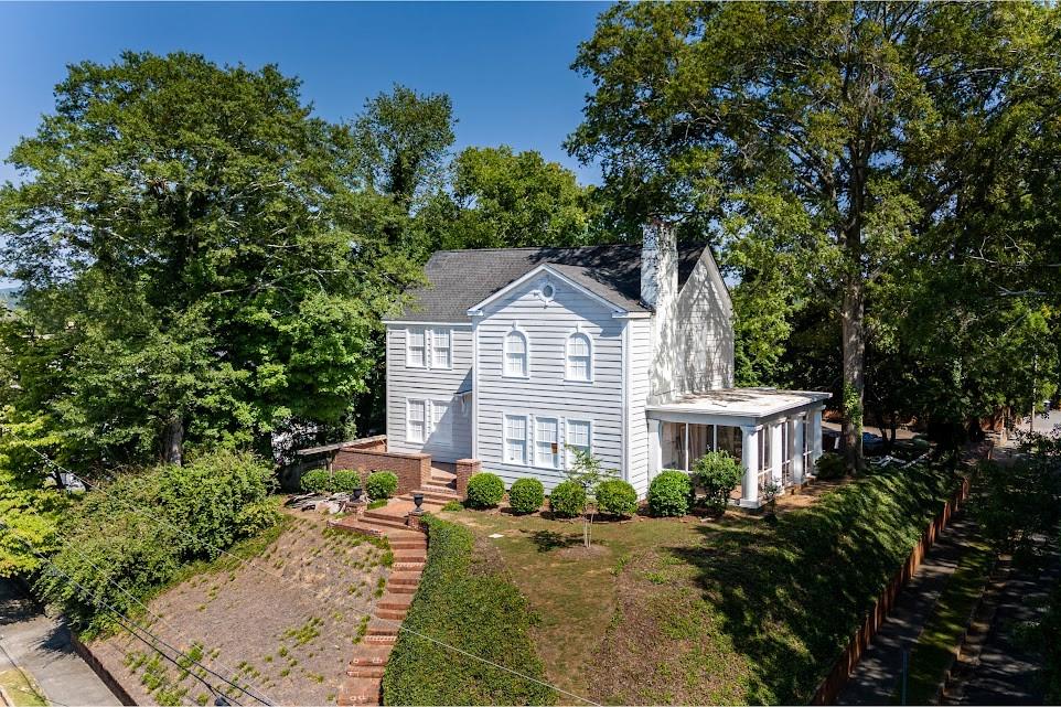 312 East 3rd Street Rome, GA 30161 - Photo 2 of 9 a front view of a house with a garden
