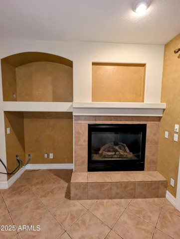 a living room with a fireplace