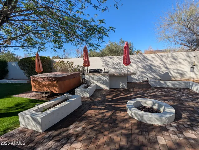 a view of a back yard from a patio