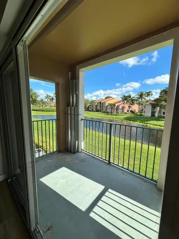 a view of a balcony with an ocean view