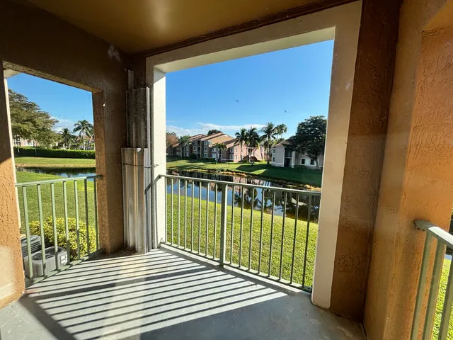a view of a balcony with lake view