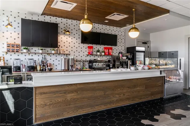 a room with fireplace and flat screen tv