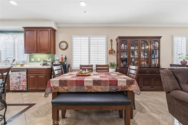 a work room with furniture and a wooden floor