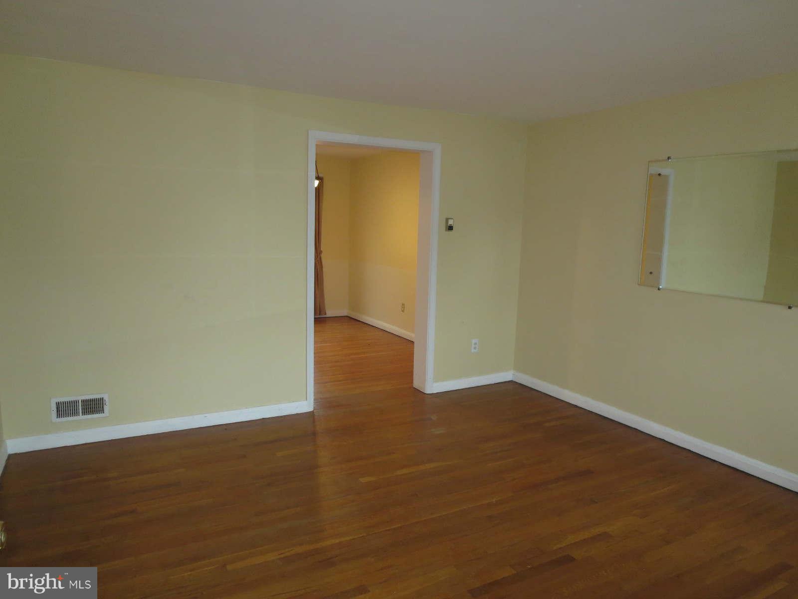 1534 Doolittle Road Baltimore, MD 21221 - Photo 2 of 17 Living Room w/ Hardwoods