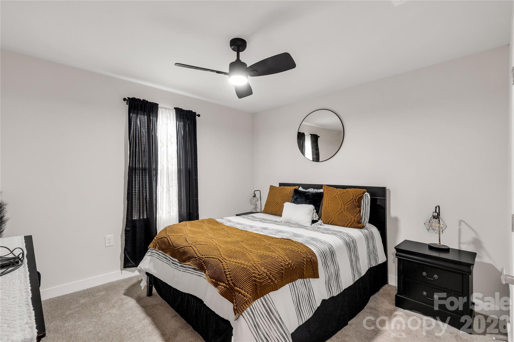 810 Purslane Street Lancaster, SC 29720 - Photo 13 of 24 a bedroom with a bed and a dresser