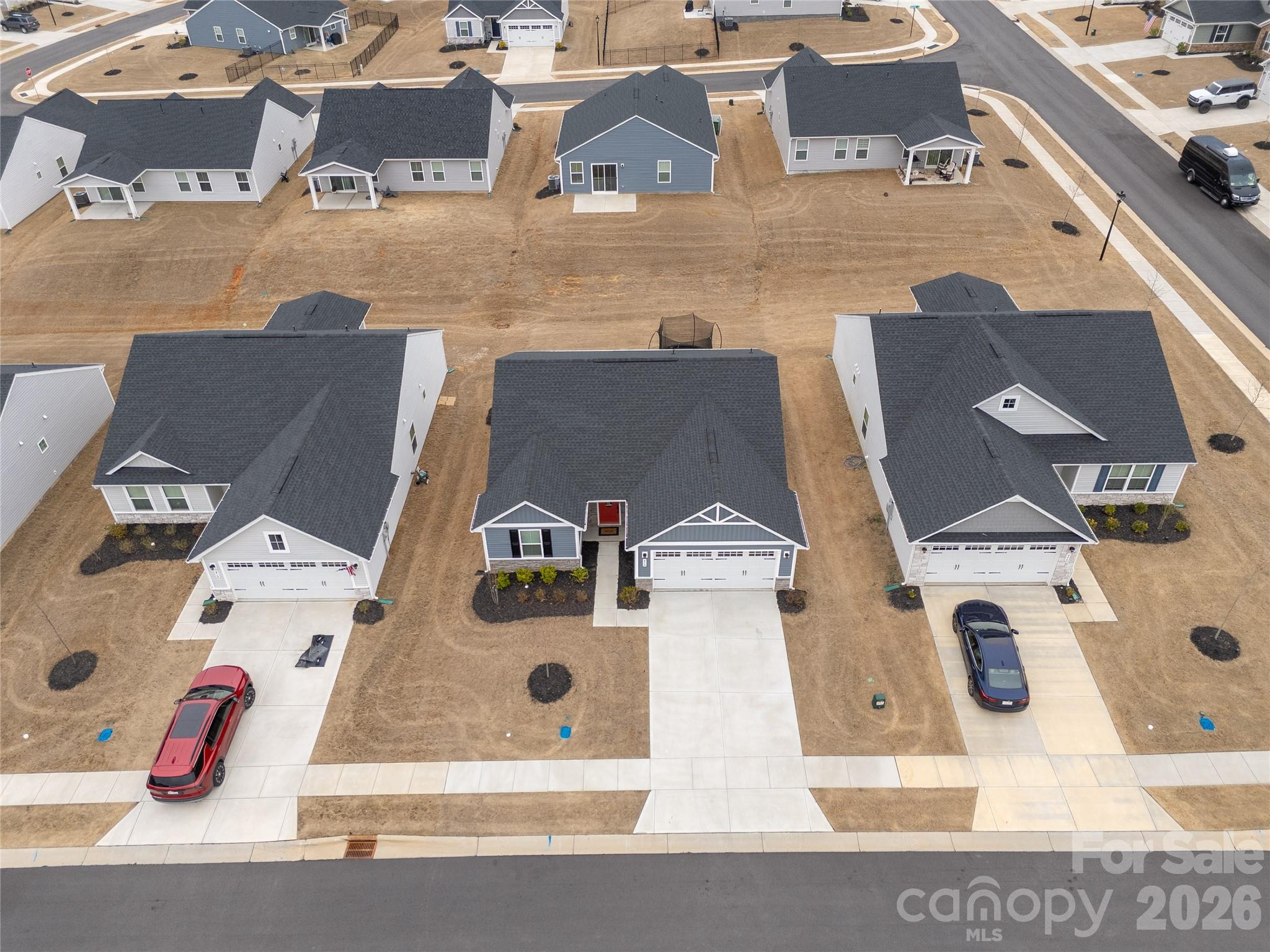 810 Purslane Street Lancaster, SC 29720 - Photo 21 of 24 an aerial view of residential houses with outdoor space