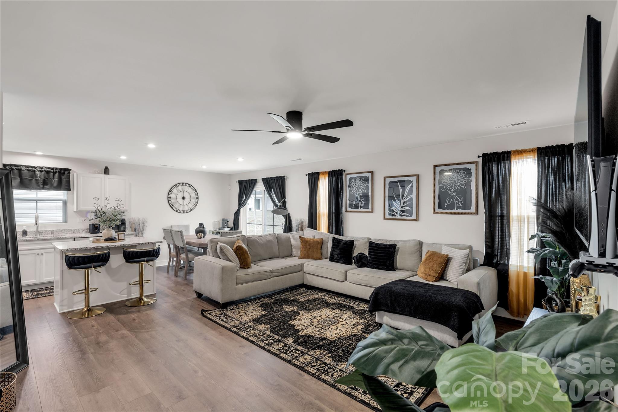 810 Purslane Street Lancaster, SC 29720 - Photo 4 of 24 a living room with furniture and a flat screen tv