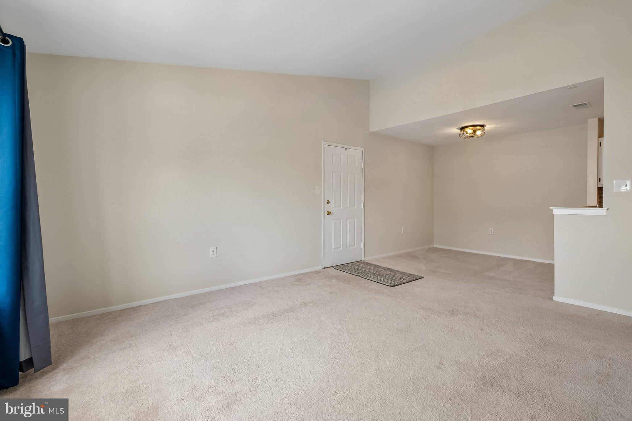 7822 Harrowgate Circle, Unit D Springfield, VA 22152 - Photo 8 of 28 View living room into dining room