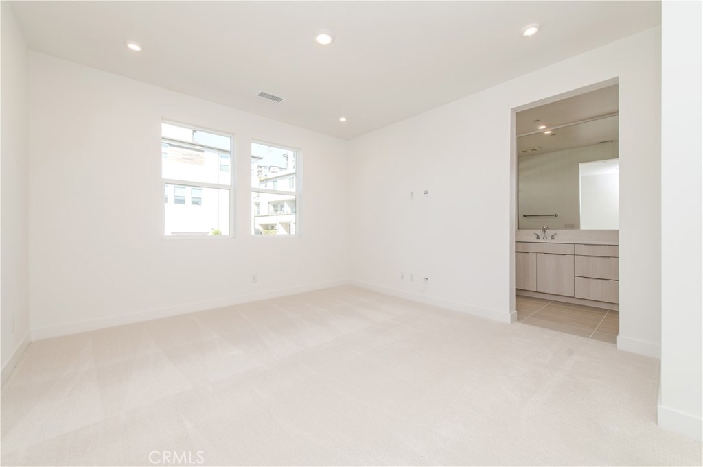 2604 Everly Drive San Diego, CA 92108 - Photo 20 of 33 an empty room with windows and entrance