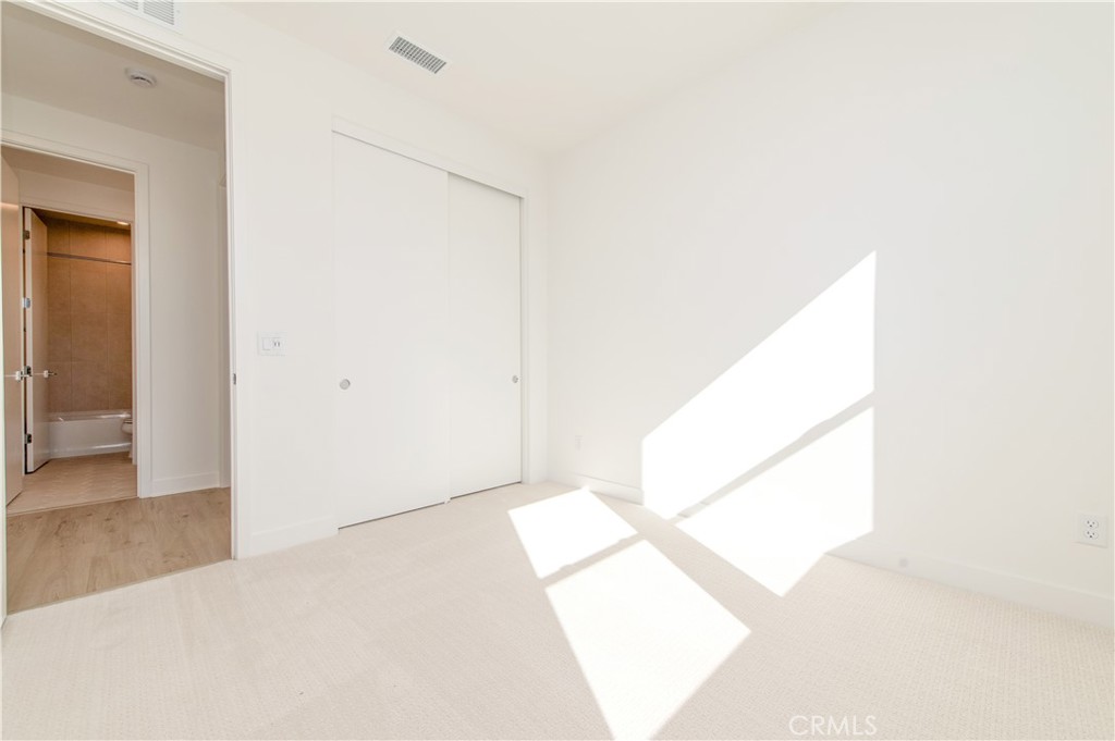 2604 Everly Drive San Diego, CA 92108 - Photo 21 of 33 a view of a living room with a hallway
