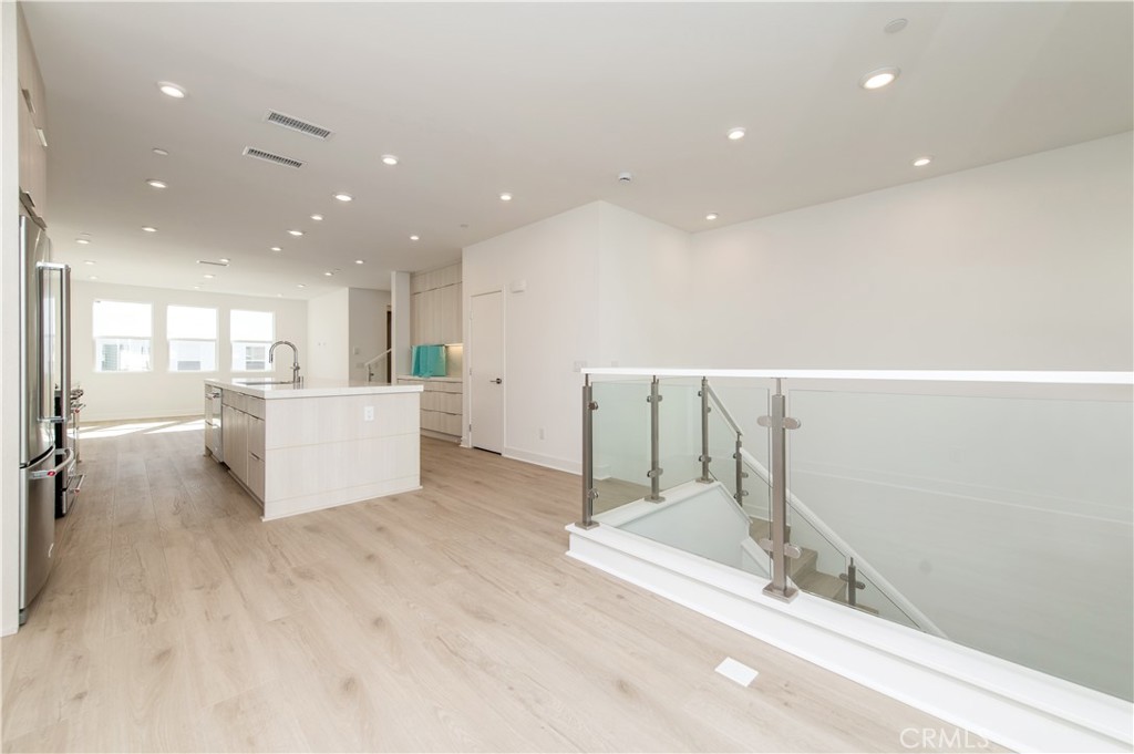 2604 Everly Drive San Diego, CA 92108 - Photo 5 of 33 a view of a living room and kitchen with a sink
