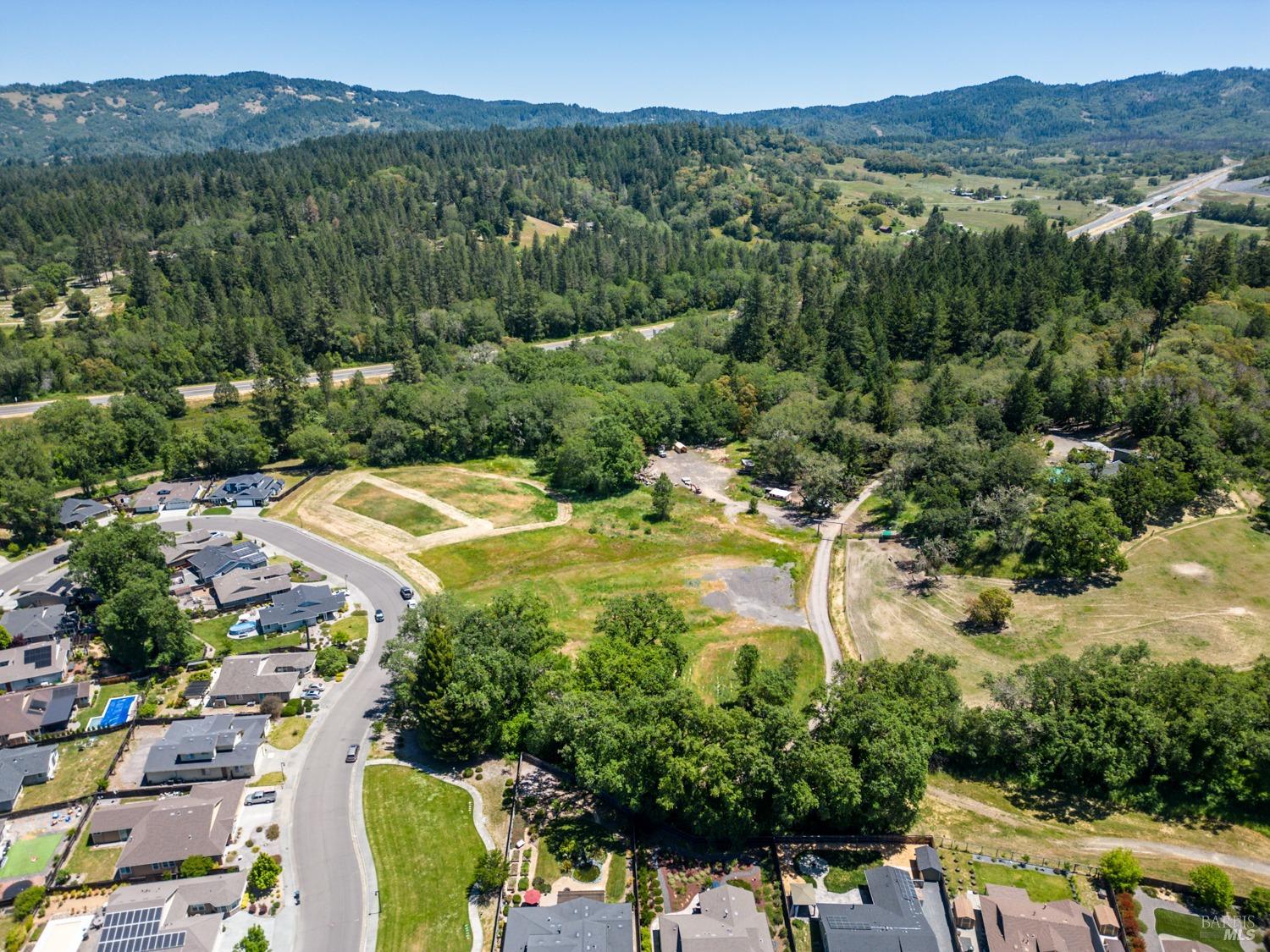 450 Grove Street Willits, CA 95490 - Photo 7 of 7 a view of a lake with mountains in the background