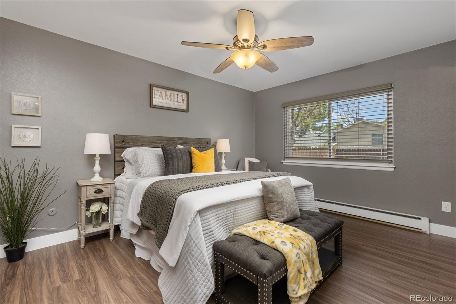 3692 South Mobile Way Aurora, CO 80013 - Photo 15 of 48 a bedroom with a bed and a window