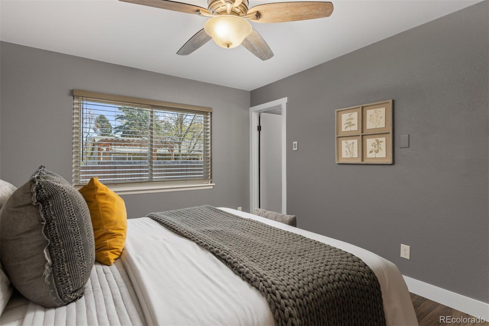 3692 South Mobile Way Aurora, CO 80013 - Photo 17 of 48 a bedroom with a bed and window
