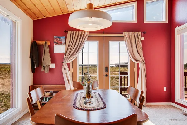a room with a window a sink and potted plant