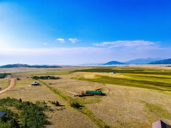 a view of a room with a water heater and a mountain view