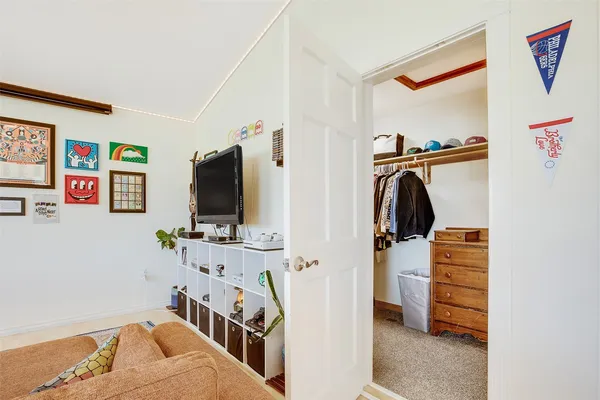 a black and white photo of a white wall