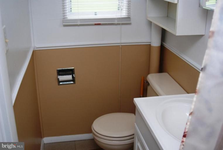 6165 Tolchester Road Rock Hall, MD 21661 - Photo 3 of 10 Full bath on main level