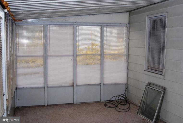 6165 Tolchester Road Rock Hall, MD 21661 - Photo 8 of 10 Enclosed porch