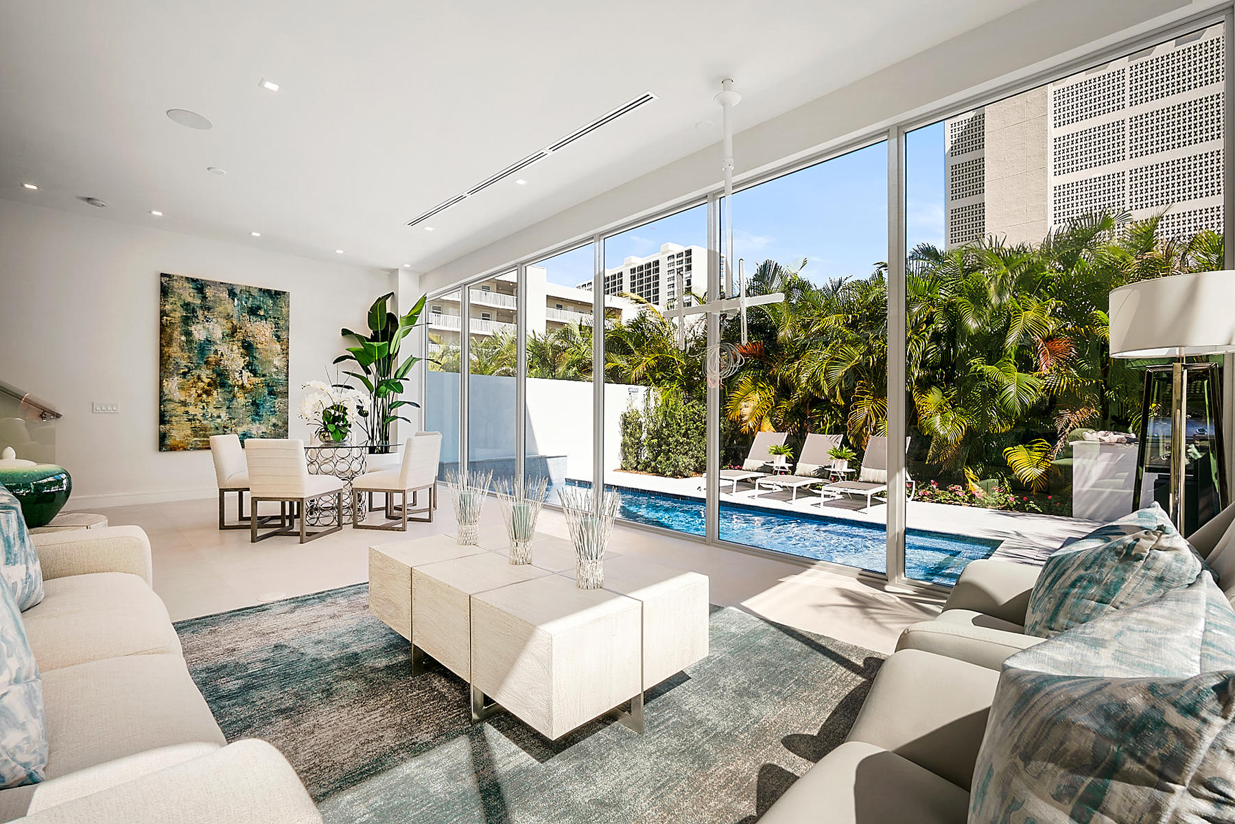 3092 Banyan Road, Unit A Boca Raton, FL 33432 - Photo 11 of 49 a living room with furniture and a large window