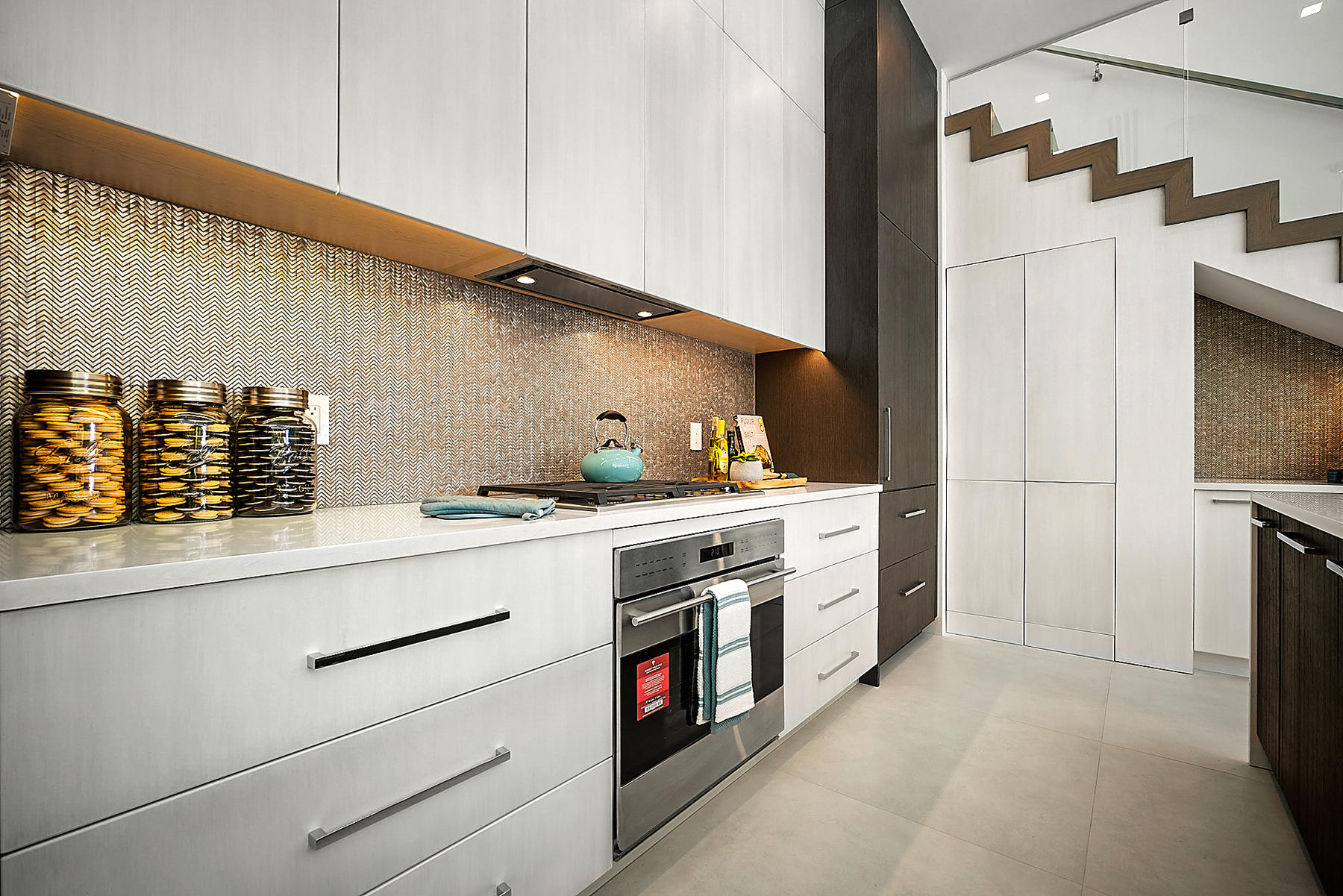 3092 Banyan Road, Unit A Boca Raton, FL 33432 - Photo 19 of 49 a kitchen with stainless steel appliances cabinets and a table