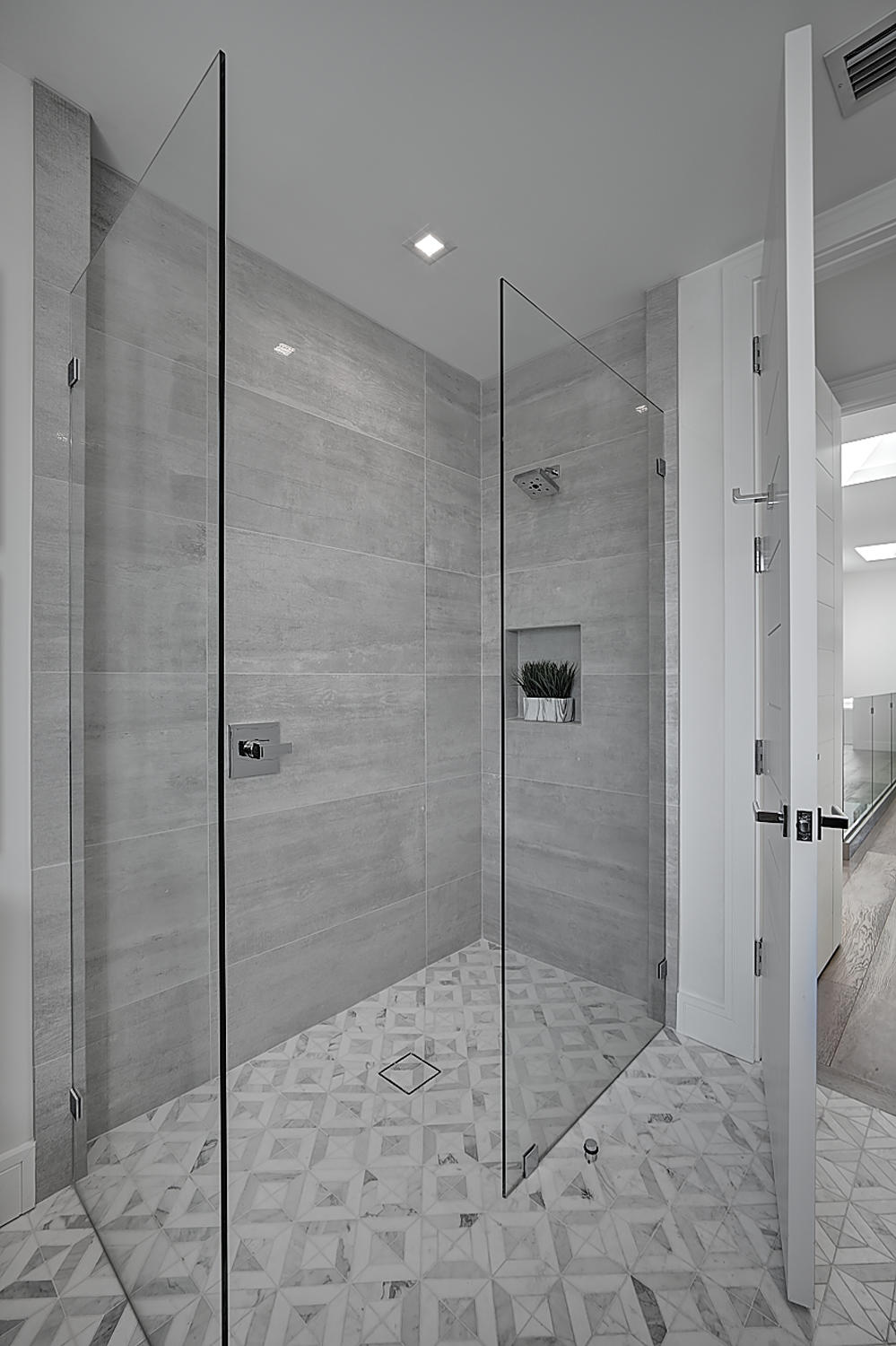 3092 Banyan Road, Unit A Boca Raton, FL 33432 - Photo 36 of 49 a bathroom with a shower and a toilet