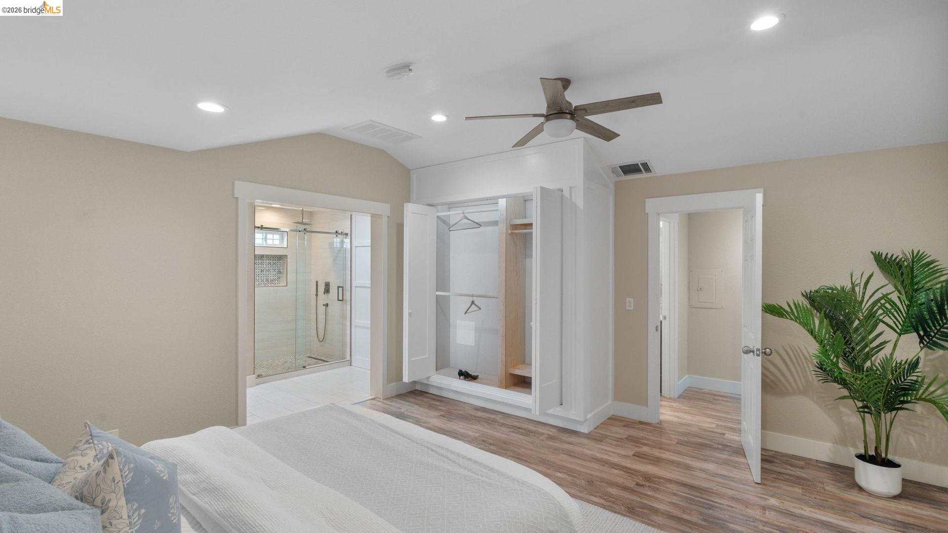 700 Brownstone Road Oakley, CA 94561 - Photo 31 of 58 a bedroom with a bed and a potted plant