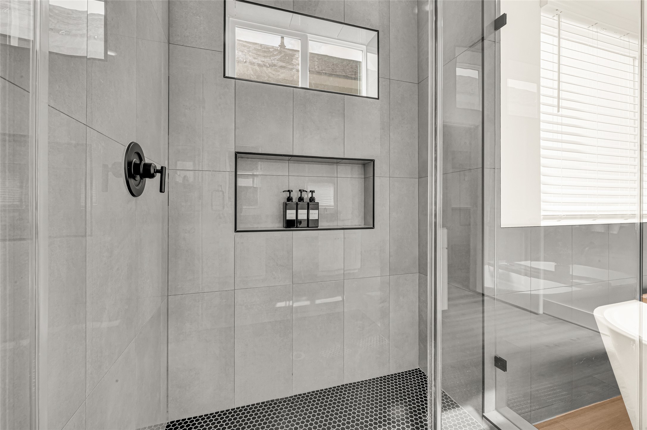 4201 Stassen Street Houston, TX 77051 - Photo 22 of 39 a bathroom with a shower