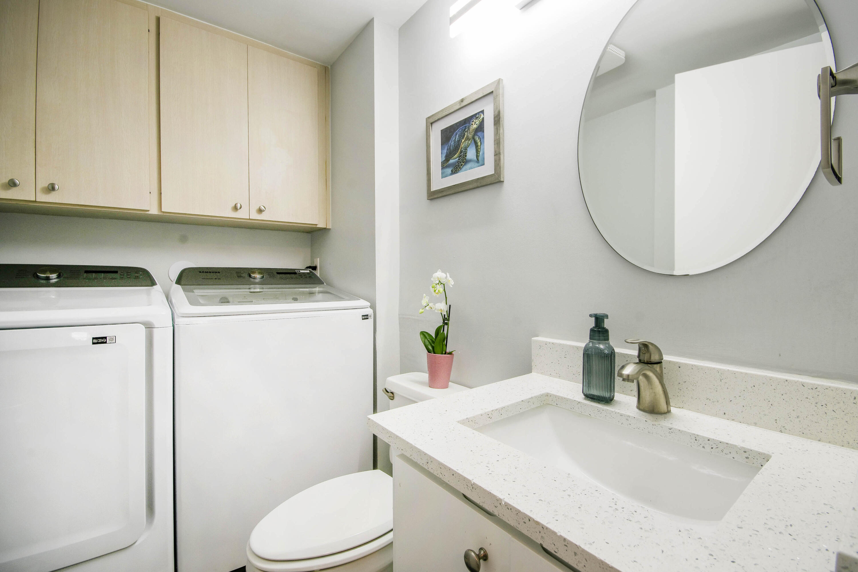 4603 Roxbury Court Boynton Beach, FL 33436 - Photo 14 of 19 a bathroom with a sink a toilet and a mirror