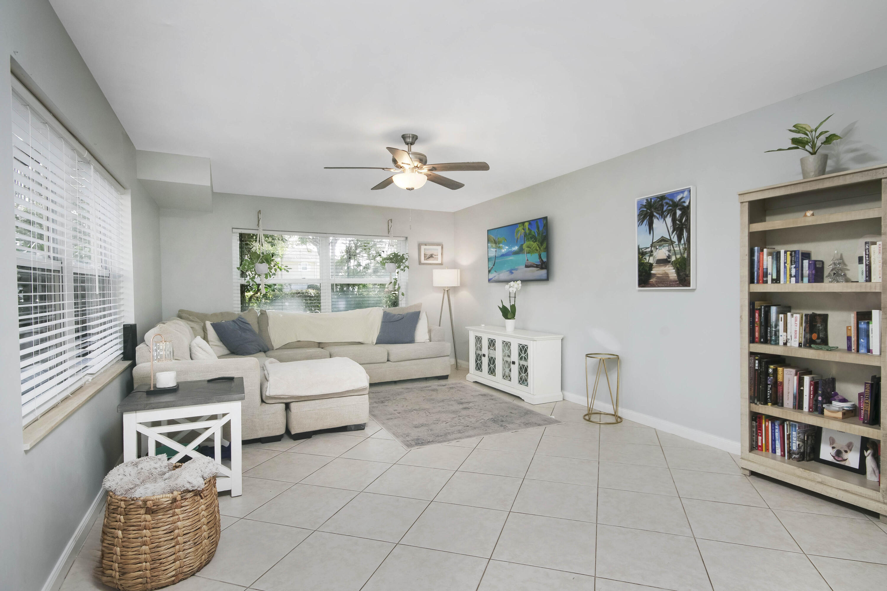 4603 Roxbury Court Boynton Beach, FL 33436 - Photo 7 of 19 a living room with furniture and a bookshelf