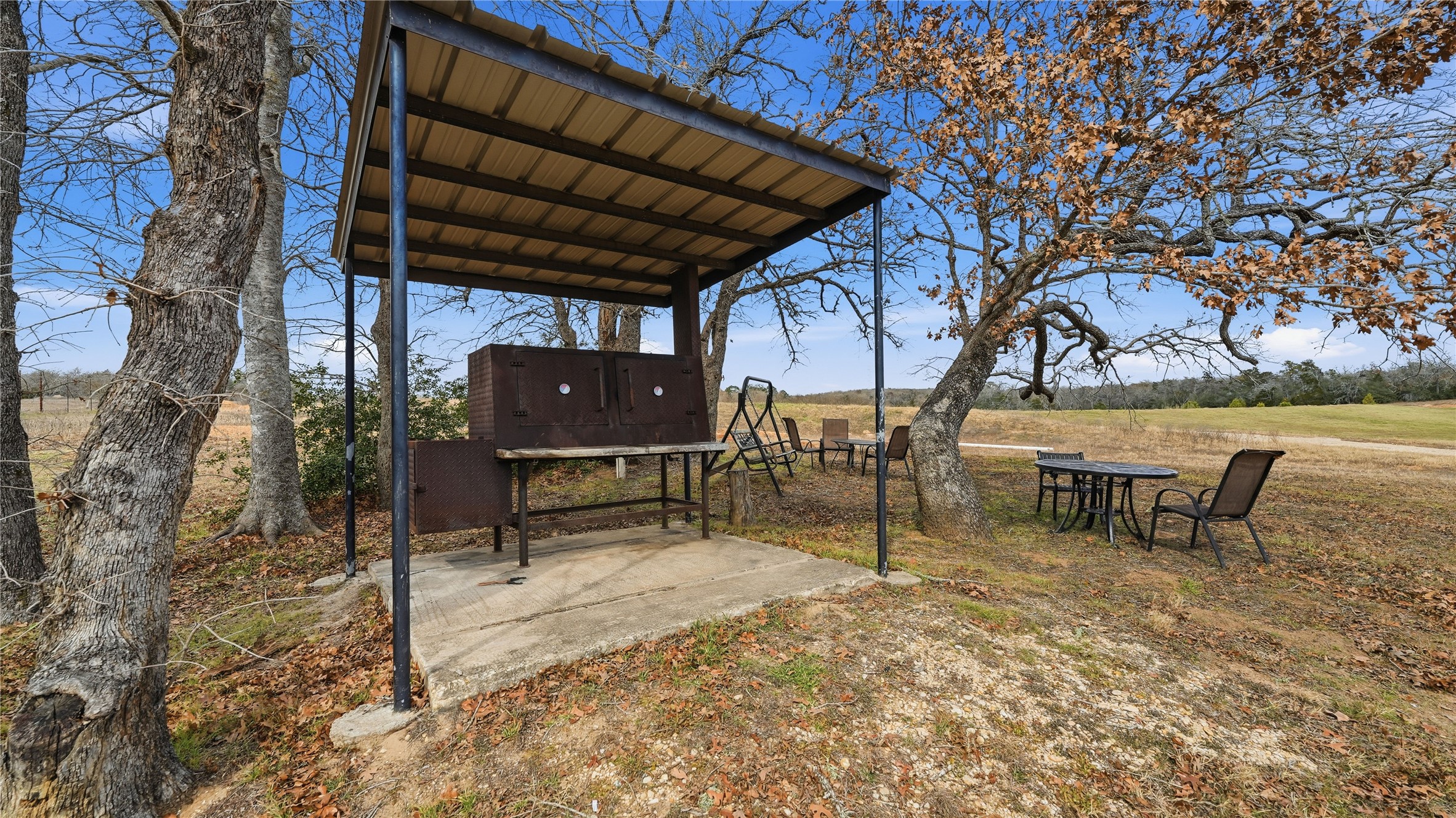 218 Little Ranch Road, Unit E Red Rock, TX 78662 - Photo 4 of 22 View of yard with a patio area