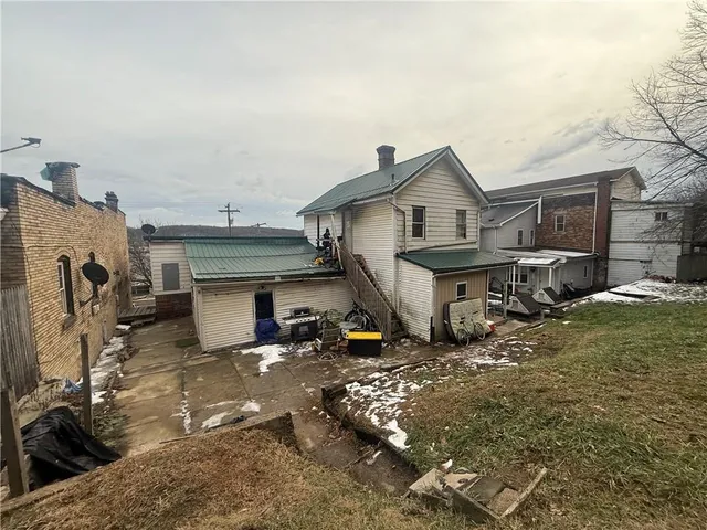 a view of a house with a patio