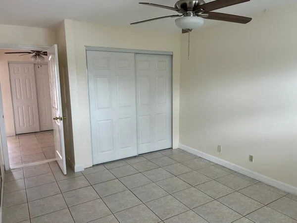 a front view of residential houses with yard