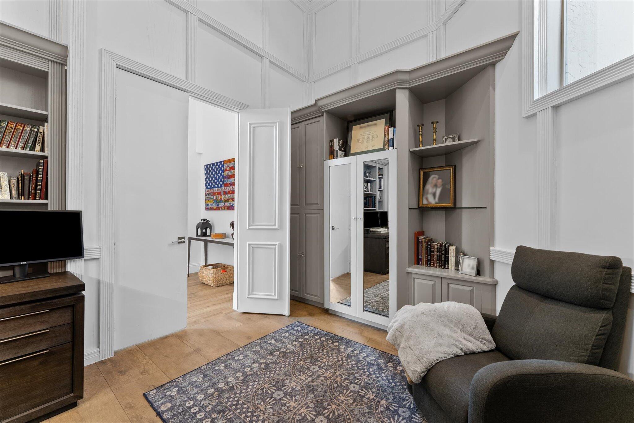 7955 Mandarin Drive Boca Raton, FL 33433 - Photo 33 of 74 a living room with furniture a rug and a window