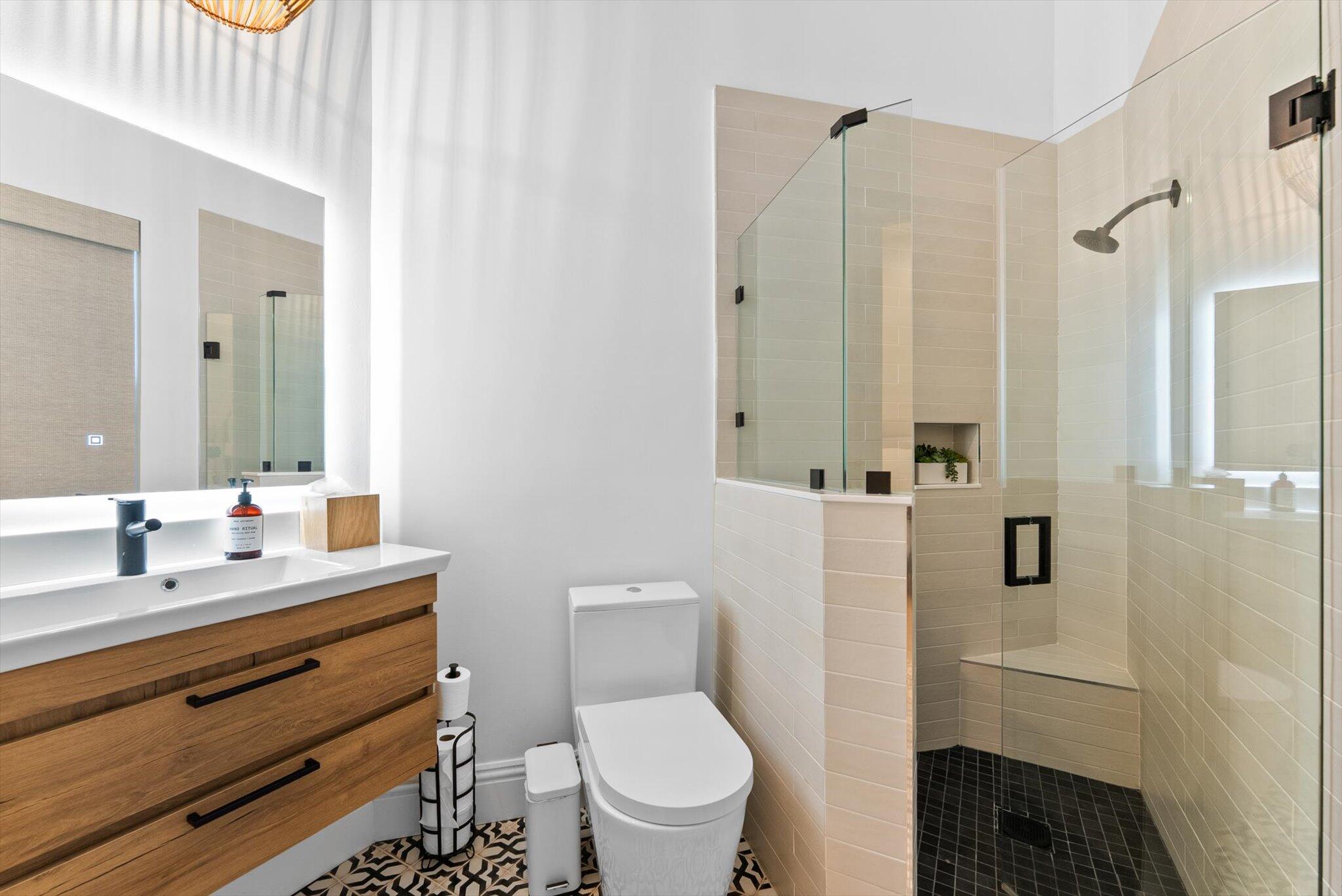 7955 Mandarin Drive Boca Raton, FL 33433 - Photo 37 of 74 a bathroom with a sink a toilet and shower