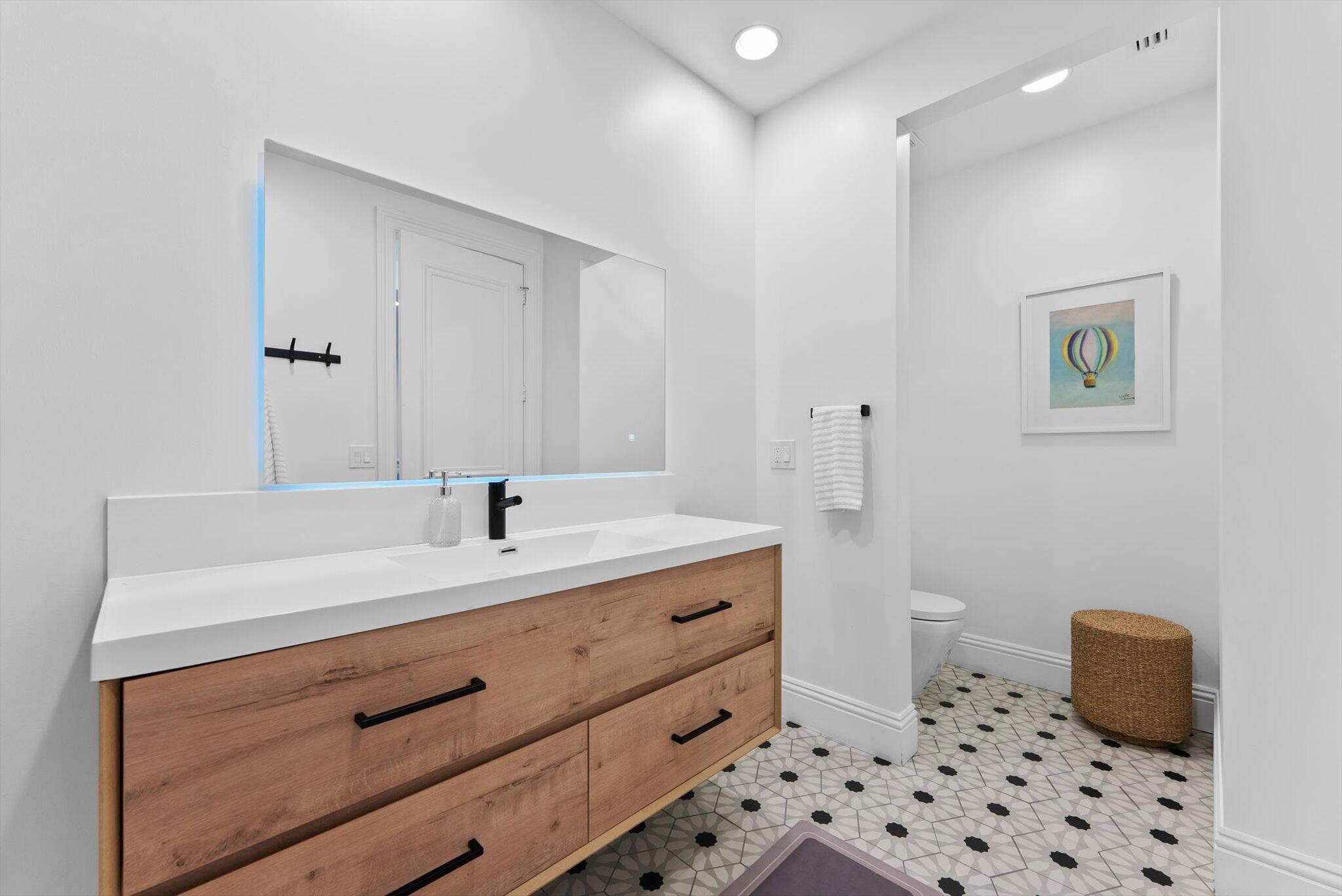 7955 Mandarin Drive Boca Raton, FL 33433 - Photo 43 of 74 a bathroom with a sink a toilet and shower