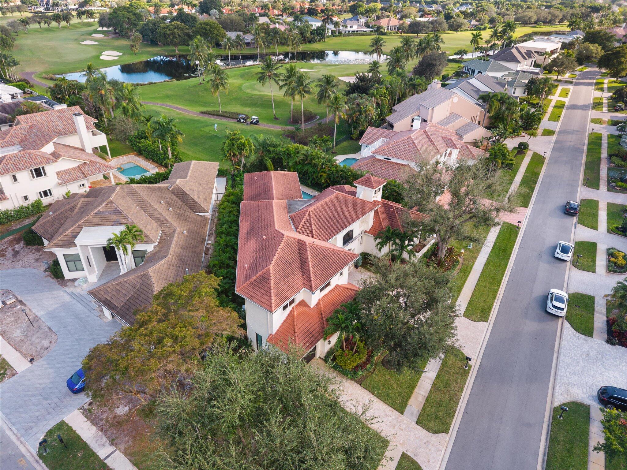 7955 Mandarin Drive Boca Raton, FL 33433 - Photo 60 of 74 an aerial view of a house with a lake view