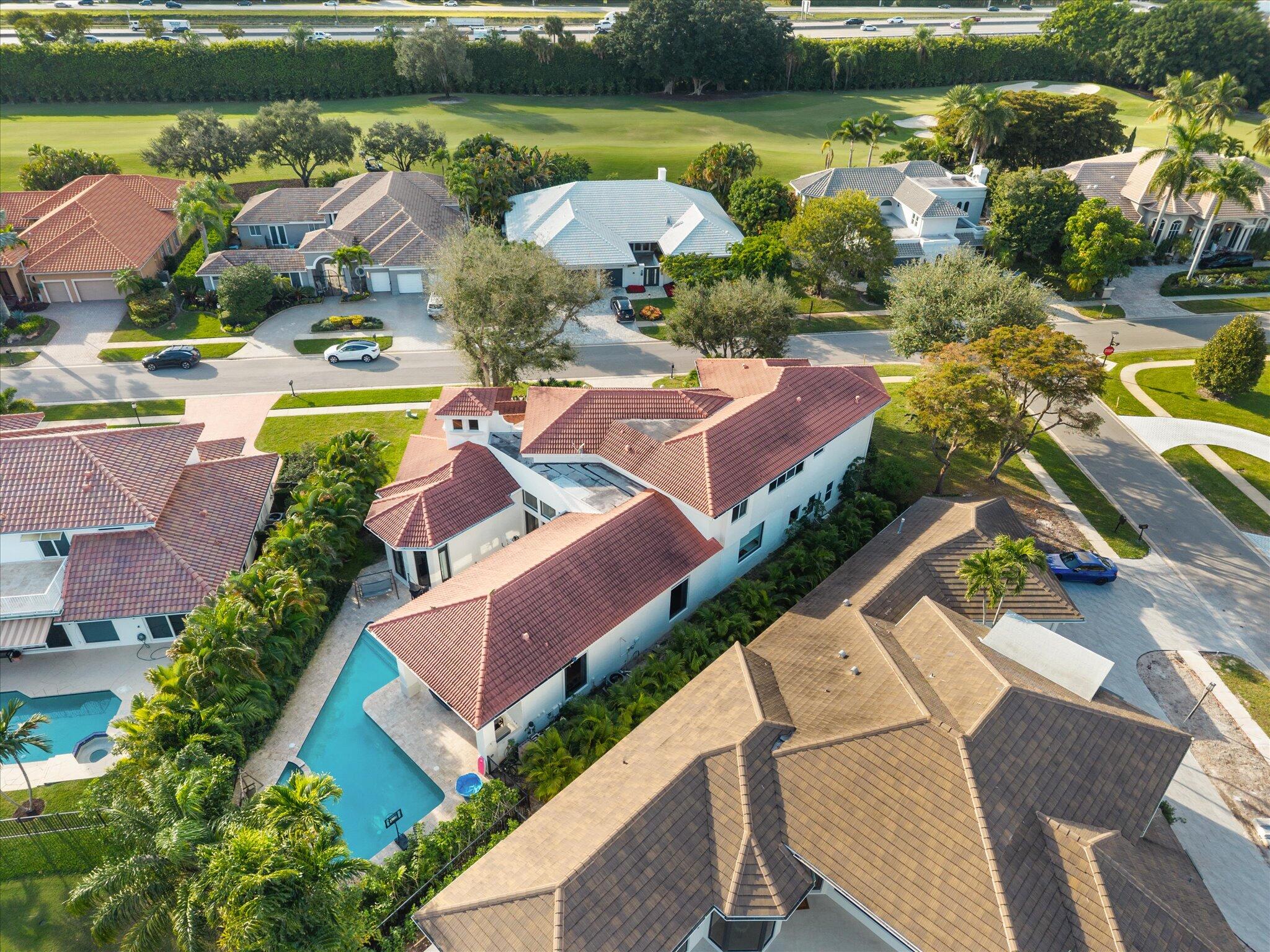 7955 Mandarin Drive Boca Raton, FL 33433 - Photo 62 of 74 an aerial view of residential houses with outdoor space and lake view